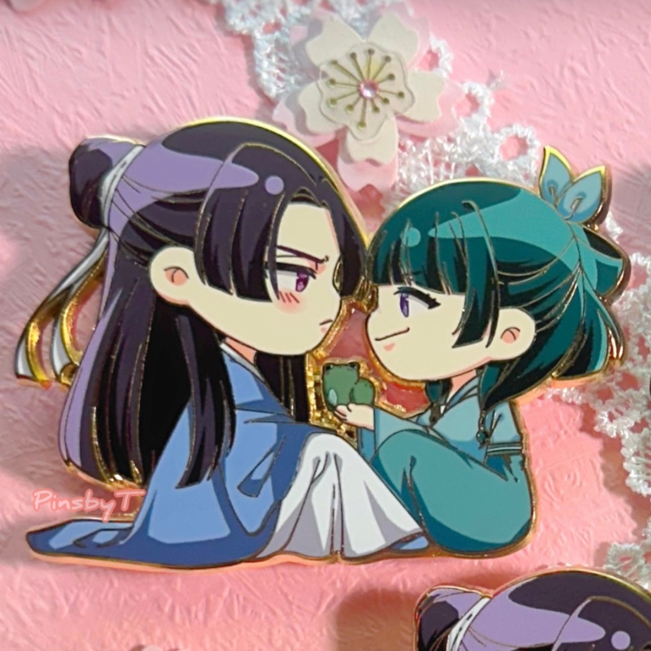 “…A frog?” J&M enamel pin